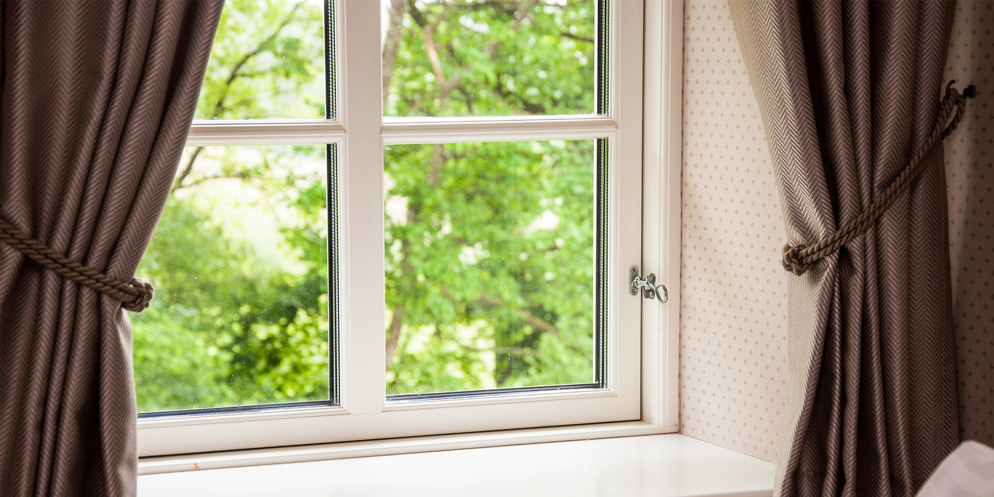 Curtains in front of a bay window 