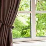 Curtains in front of a bay window