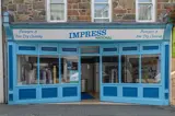 Outside the Impress shop